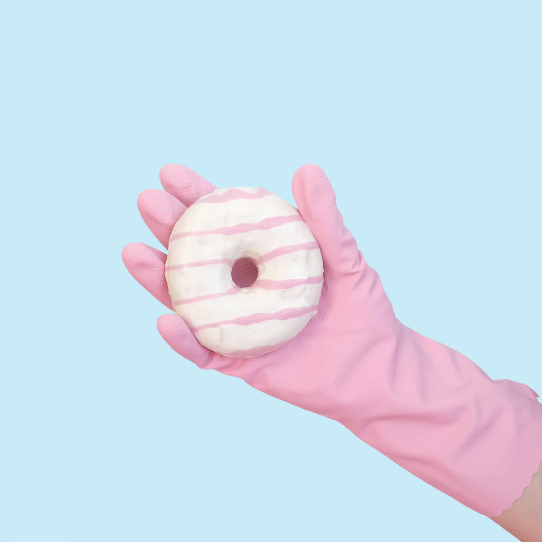 a-hand-with-a-donut